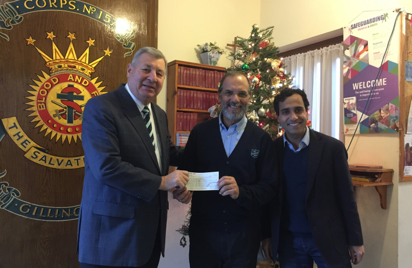 The handing over of the cheque