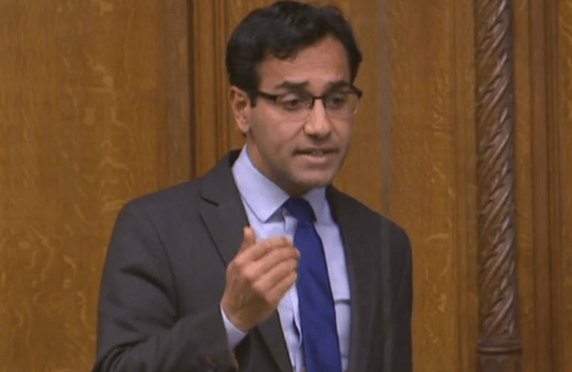 Rehman talking at the Aleppo debate