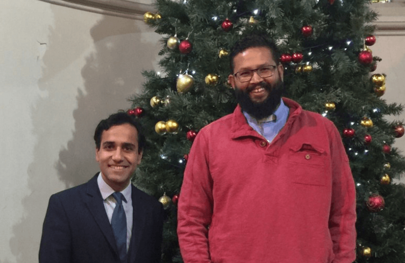 Rehman with Reverend Saju