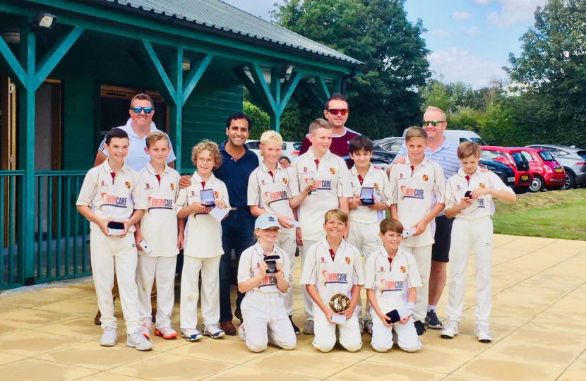 Rehman with the winning cricket team