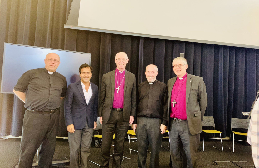 Rehman with organisers of the Conference