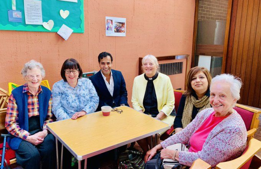 Rehman with Sunday Service attendees