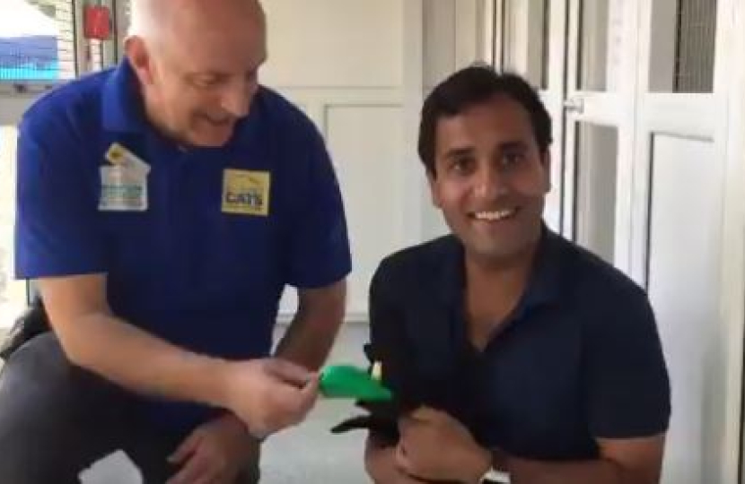 Rehman with Cats Protection centre Manager