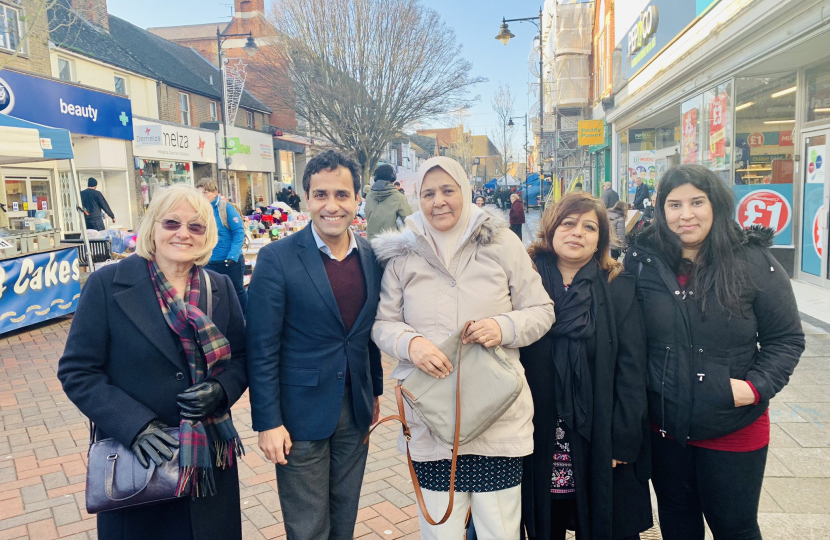 Rehman with local residents