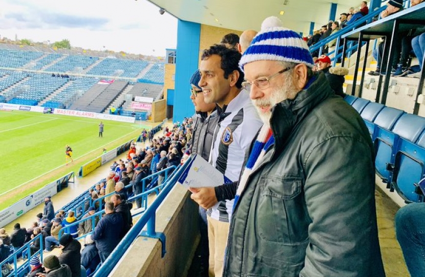 Rehman watching football at Priestfield