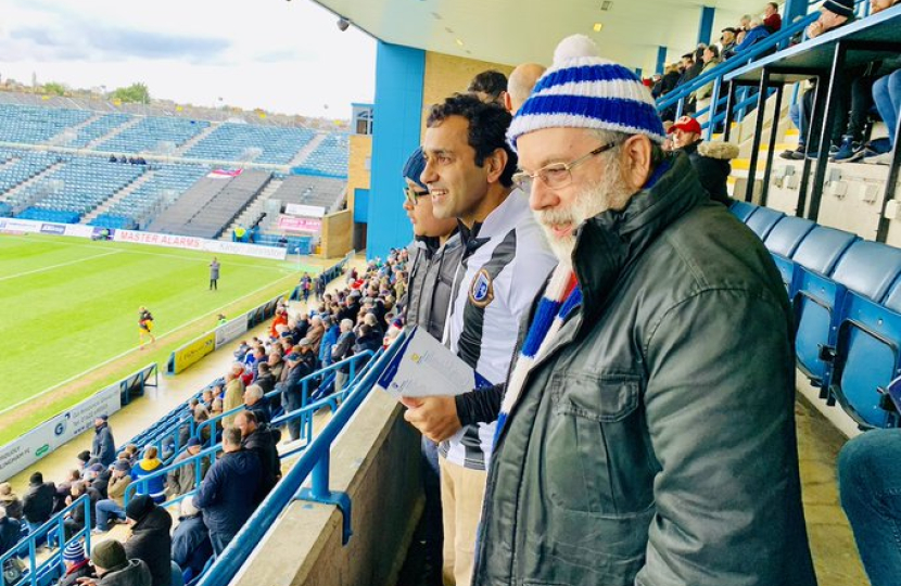 Rehman watching football at Priestfield
