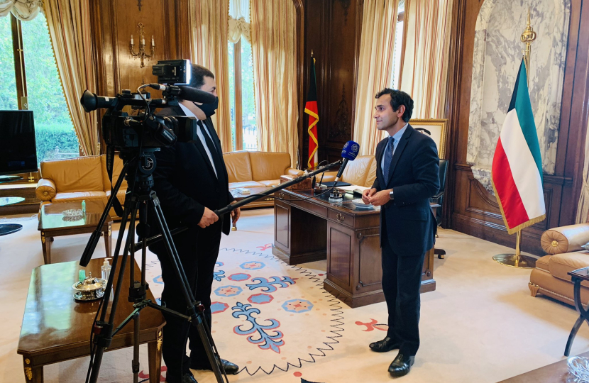 Rehman being interviewed in the Kuwait Embassy