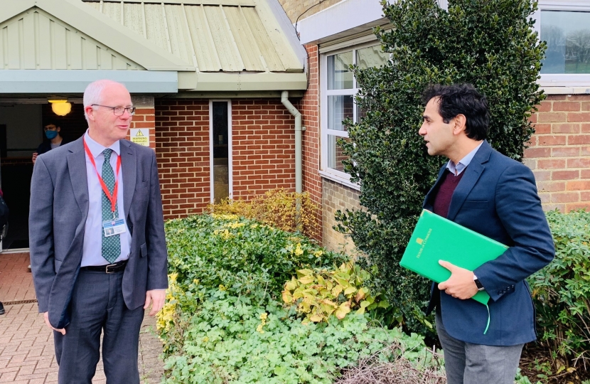 Rehman with the Headteacher of Rainham Mark Grammar School