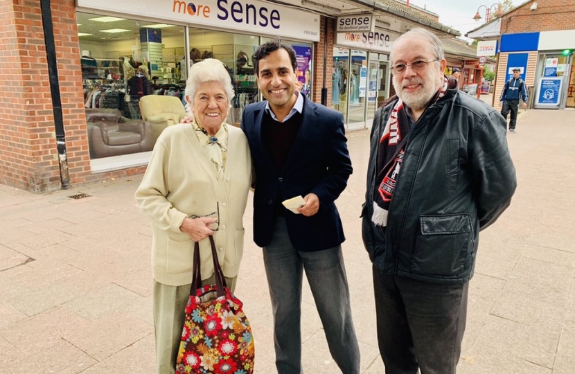 Rehman with constituents at the street surgery