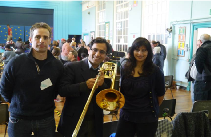 Rehman with Mr Cross (Deputy Head and band member) and Mrs Slade (Head Teacher)