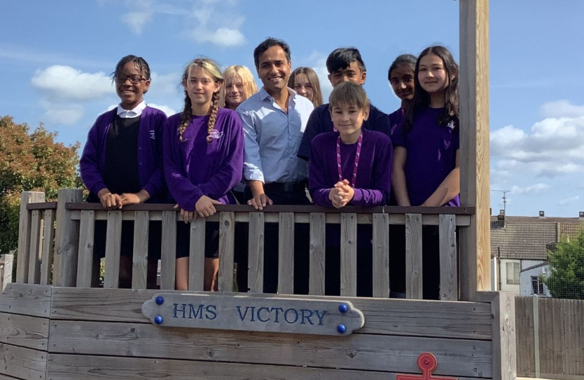Rehman with students from Oasis Academy
