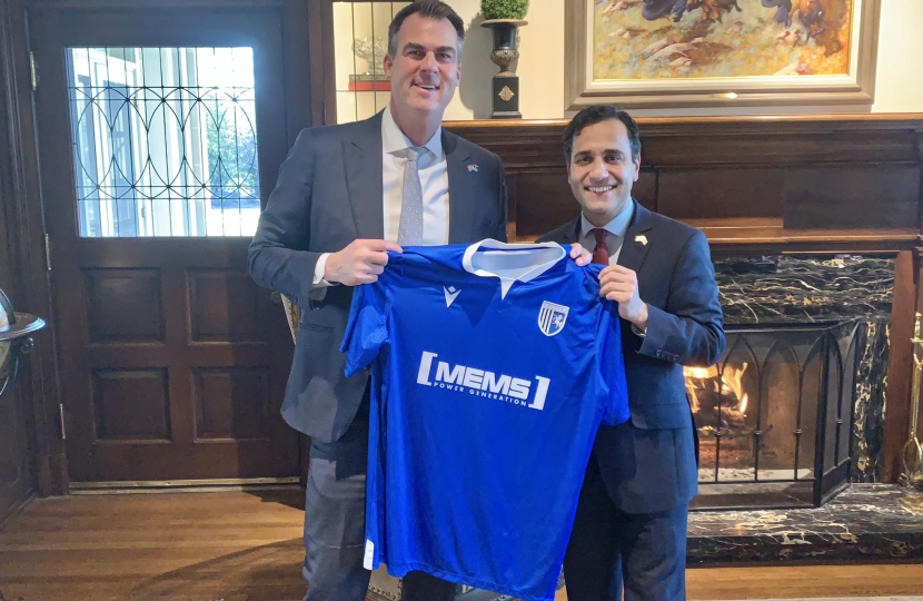 Rehman with Governor Stitt