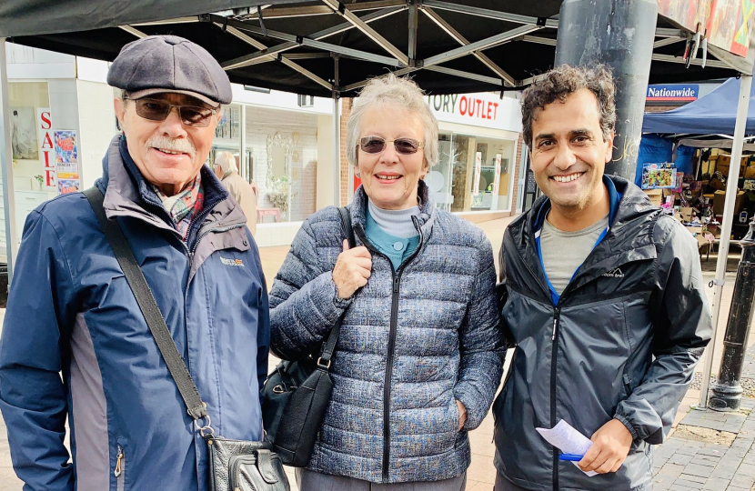 Rehman with local residents