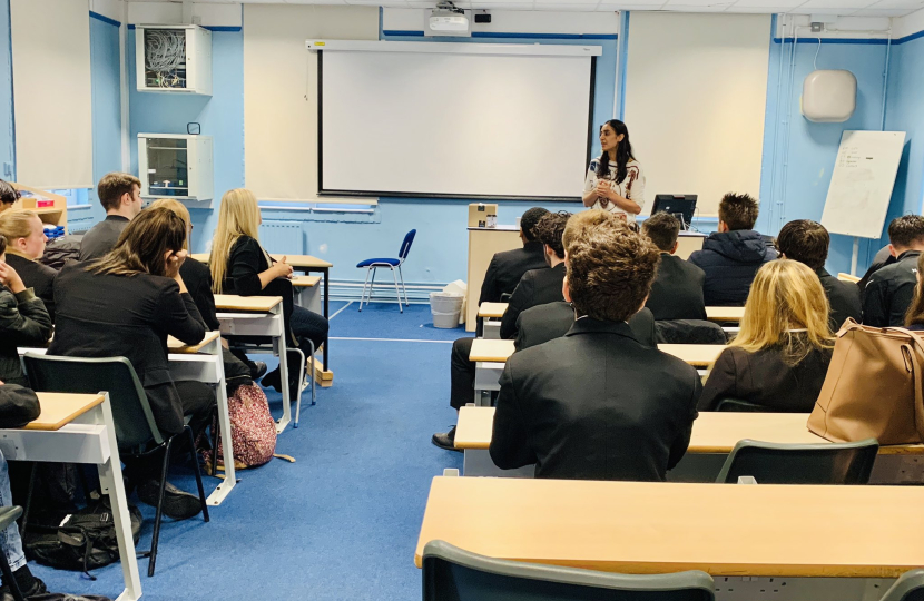 Dr Möeller speaking to pupils