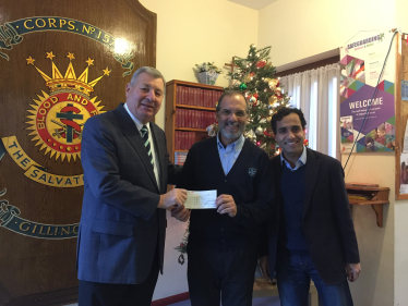 The handing over of the cheque