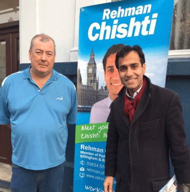 Rehman talking to a constituent