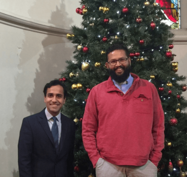 Rehman with Reverend Saju