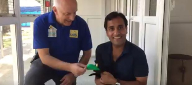 Rehman with Cats Protection centre Manager