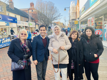 Rehman with local residents