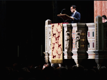 Rehman giving reading at Westminster Cathedral