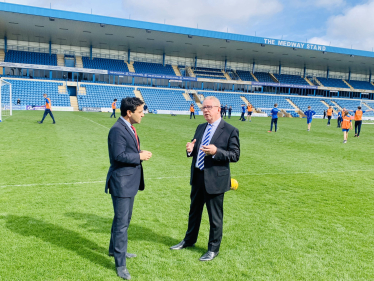 Rehman at Priestfield Stadium with Gills Chairman