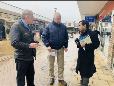 Rehman with local residents