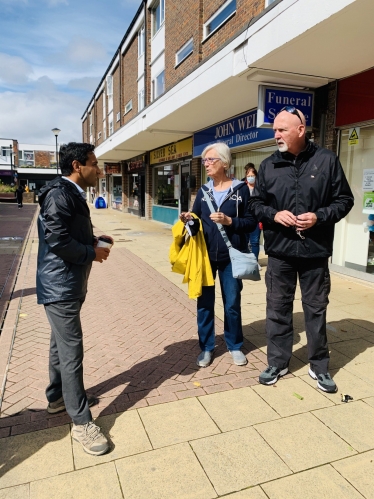 Rehman speaking with constituents