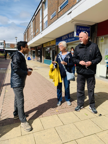 Rehman speaking with constituents