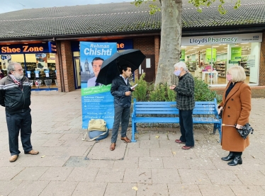 Rehman speaking with constituents