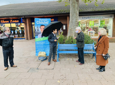 Rehman speaking with constituents