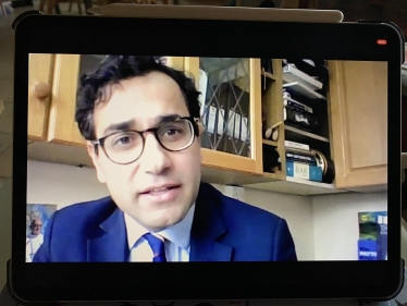 Screenshot of Rehman speaking at the virtual event