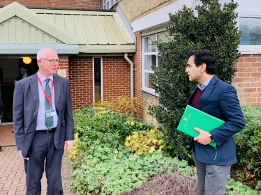 Rehman with the Headteacher of Rainham Mark Grammar School