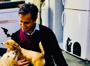 Rehman pictured with dogs at Animals Lost and Found in Kent