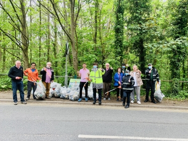 Rehman with local councillors and volunteers at the community litter pick