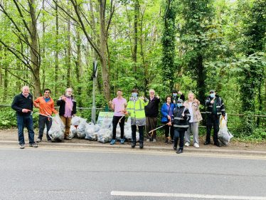 Rehman with local councillors and volunteers at the community litter pick