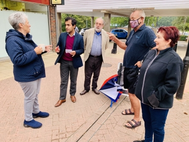 Rehman with constituents at the street surgery