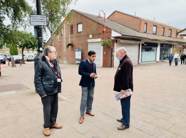 Rehman with constituents at the street surgery