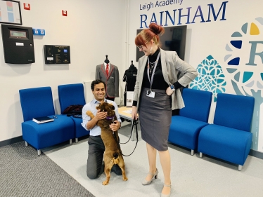 Rehman with Leigh Academy Principal & the school therapy dog