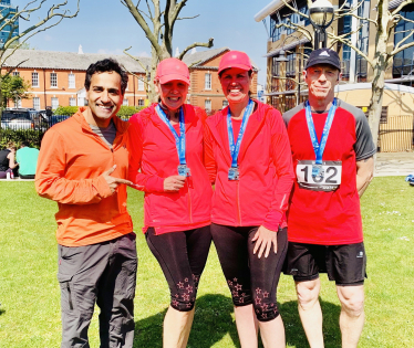 Rehman with runners at Chatham Maritime 10k 