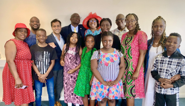 Rehman with Church members