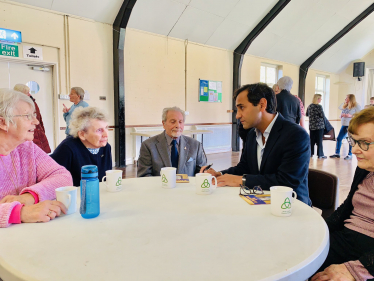 Rehman with local residents