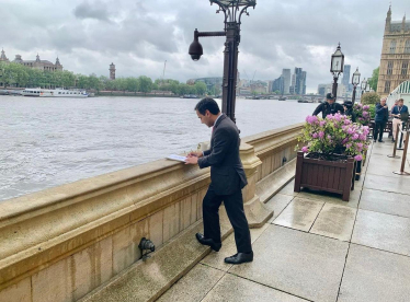 Rehman next to the Thames